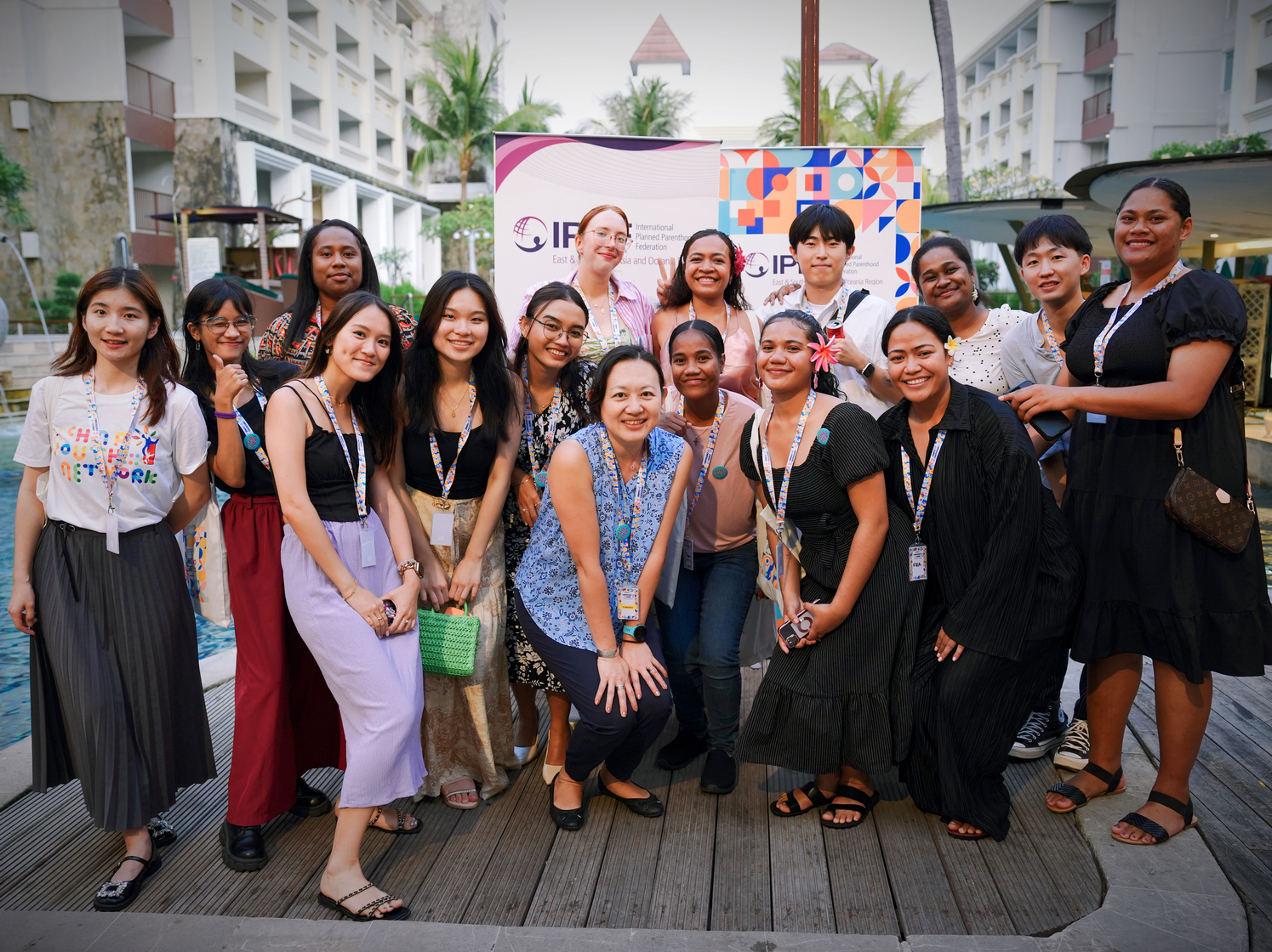 A group of women from diverse contexts posing for a photo