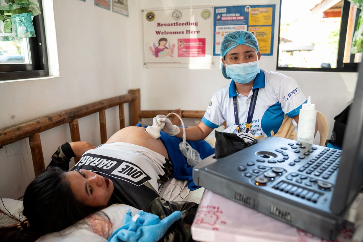 FPOP's Ruth Espenilla conducts an ultrasound at a makeshift clinic in Masbate after Typhoon Opong