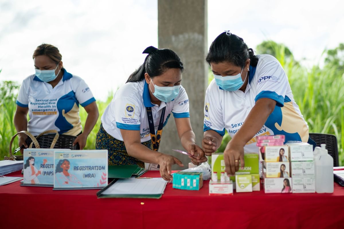 FPOP staff prepare to distribute medical supplies at a medical mission in Masbate province (1)
