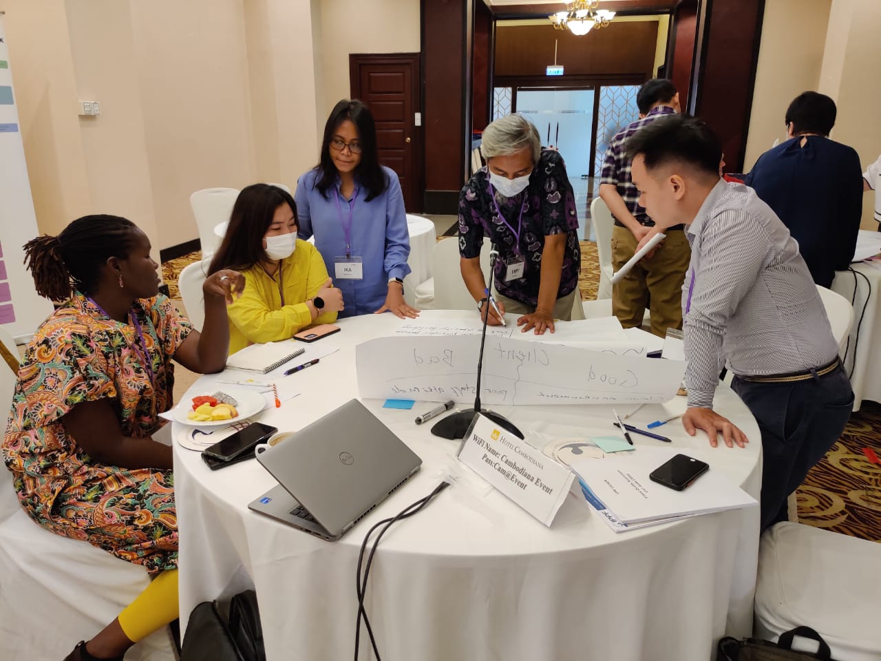 photo of participants taking part in group work 