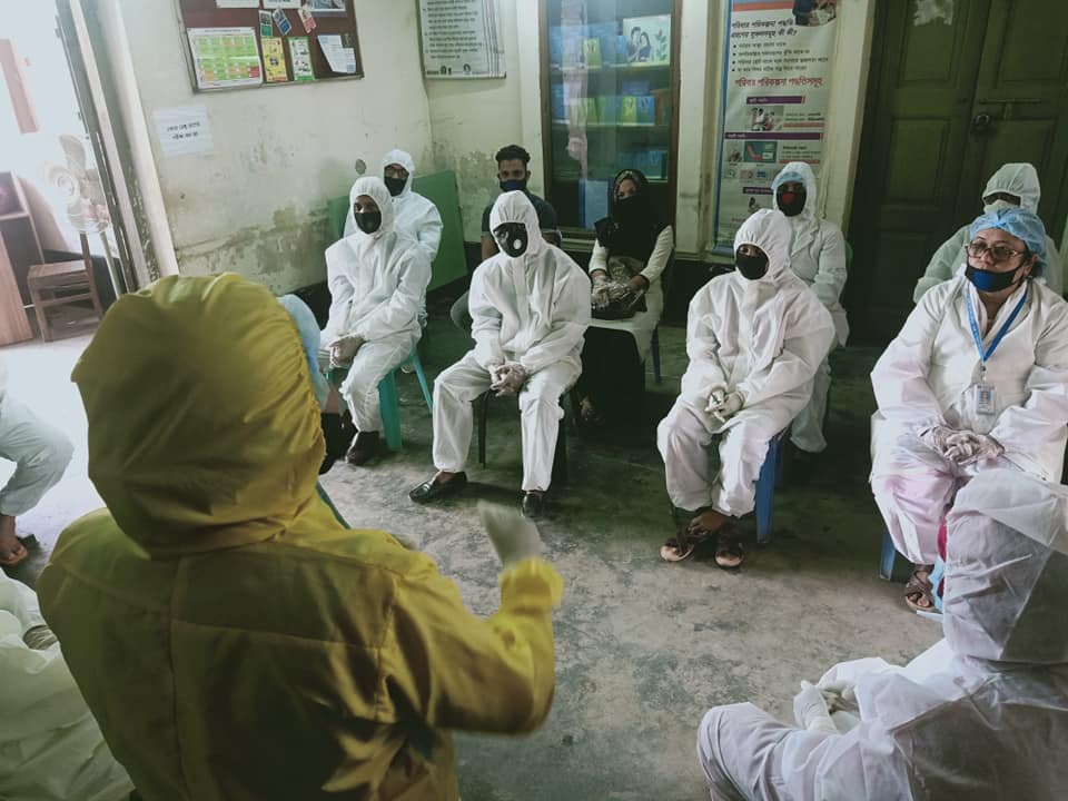 A COVID-19 awareness training workshop for staff taking place at Family Planning Association Bangladesh