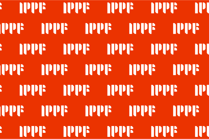 IPPF new branding logo in Fire Red background.