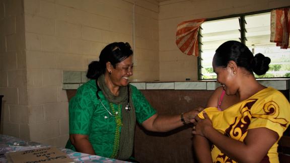 Nurse Tala administering contraceptive injection to client Josephine, Saleapaga Village. Photo credits: Phoebe Hammond