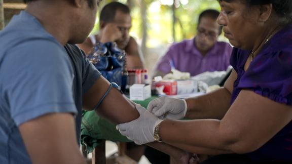 image of youth providing service in the pacific